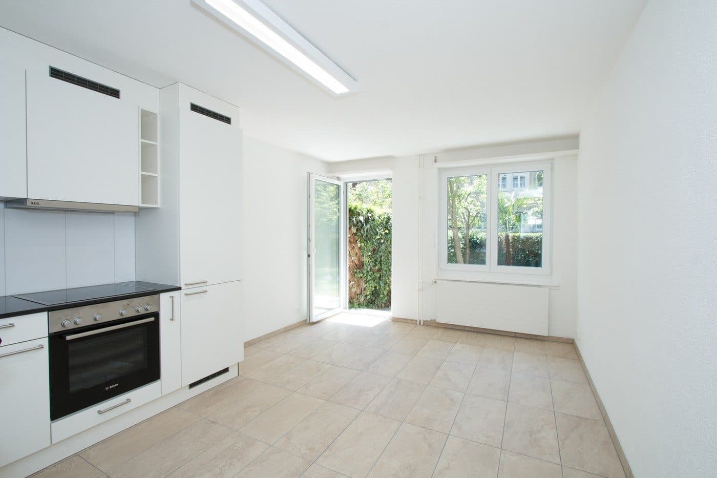 Moderne Traumwohnung mit privatem Gartensitzplatz