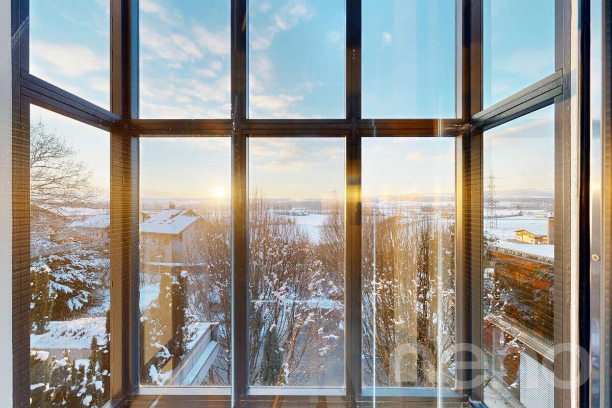 Terrassenwohnung auf zwei Ebenen mit Wintergarten und Panorama