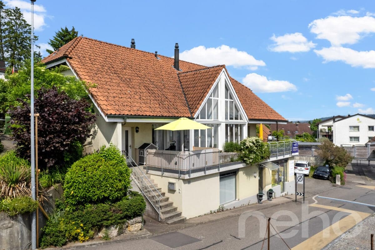 Zweifamilienhaus mit Atelier an zentraler Lage in Orpund bei Biel BE