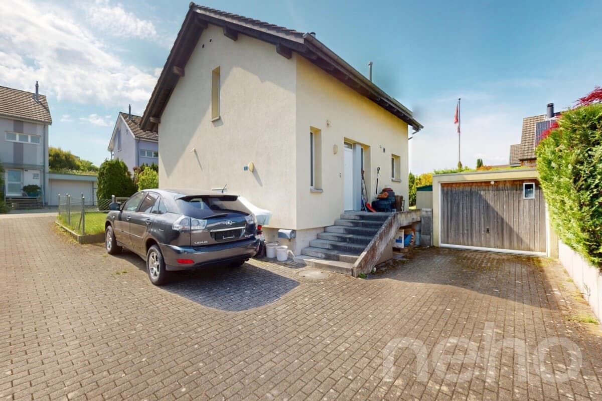 Lichtdurchflutetes EFH mit Gartenidylle und separate Garage